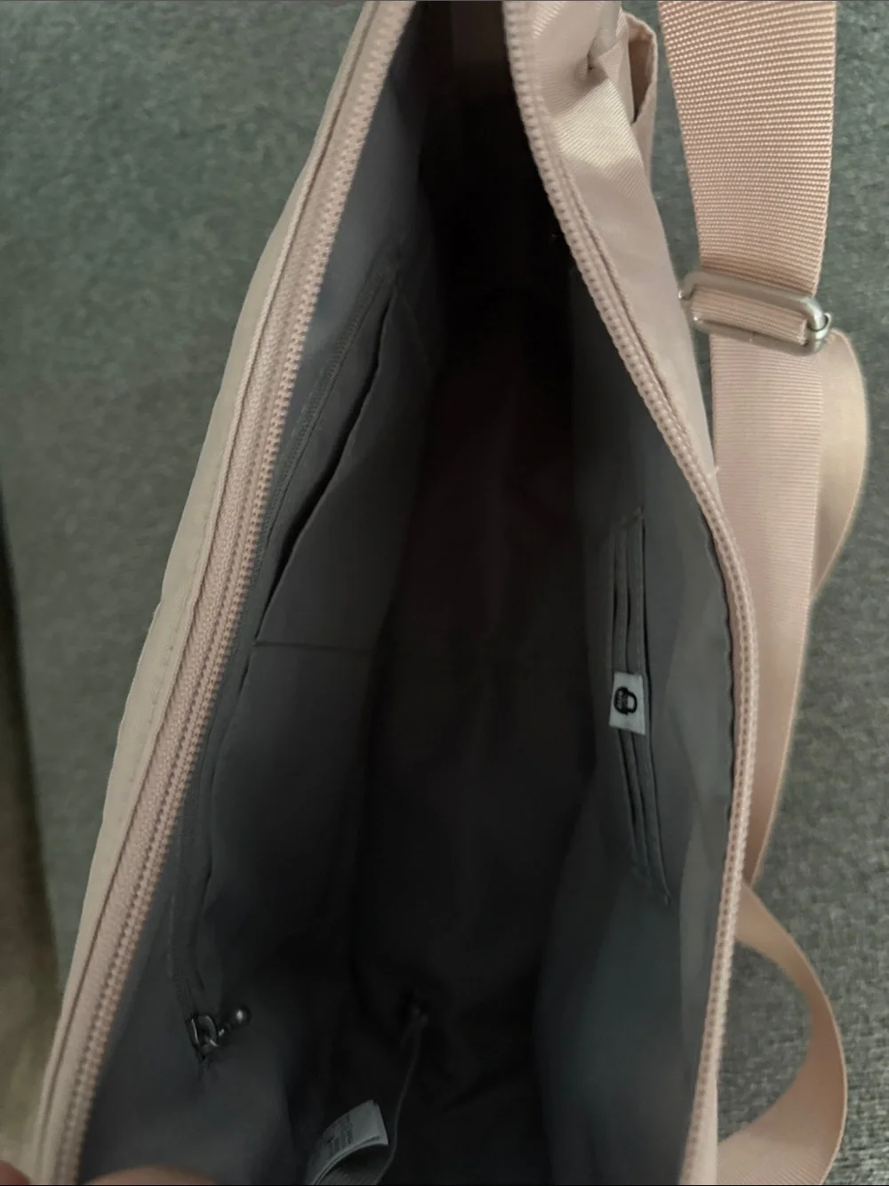 Soft Blush Hobo Bag with Front Zip Pockets